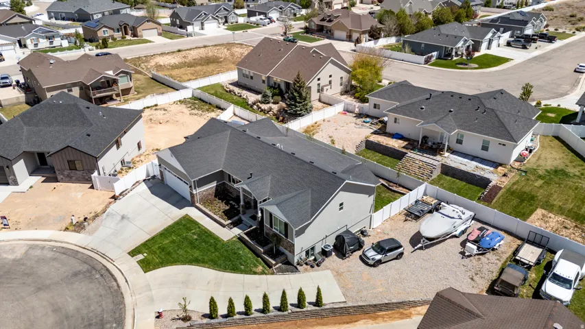 Contemporary residence featuring a multi-gabled roofline and a two-car garage