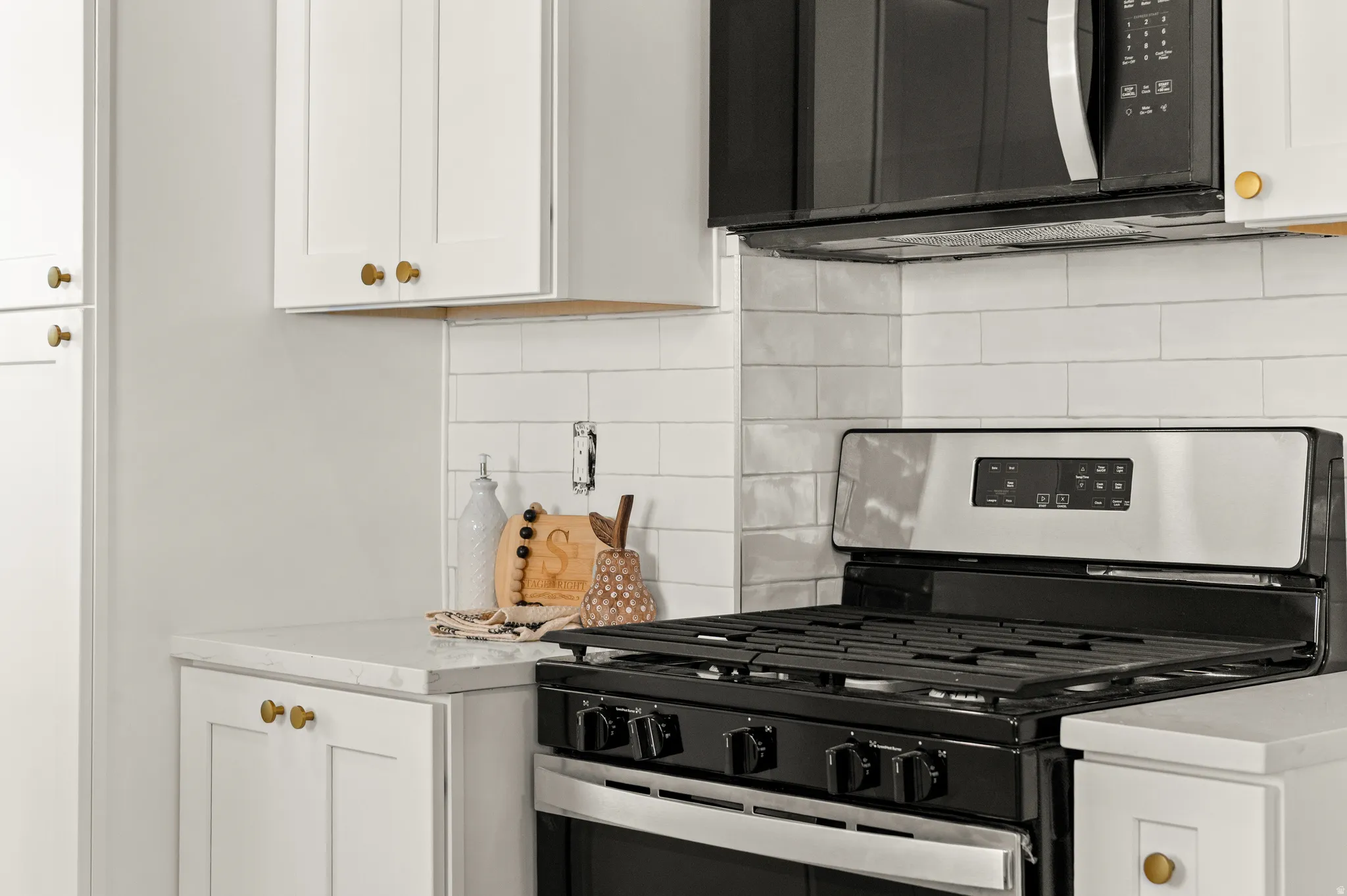 Detail of stainless steel range and microwave appliances ready for that special meal!