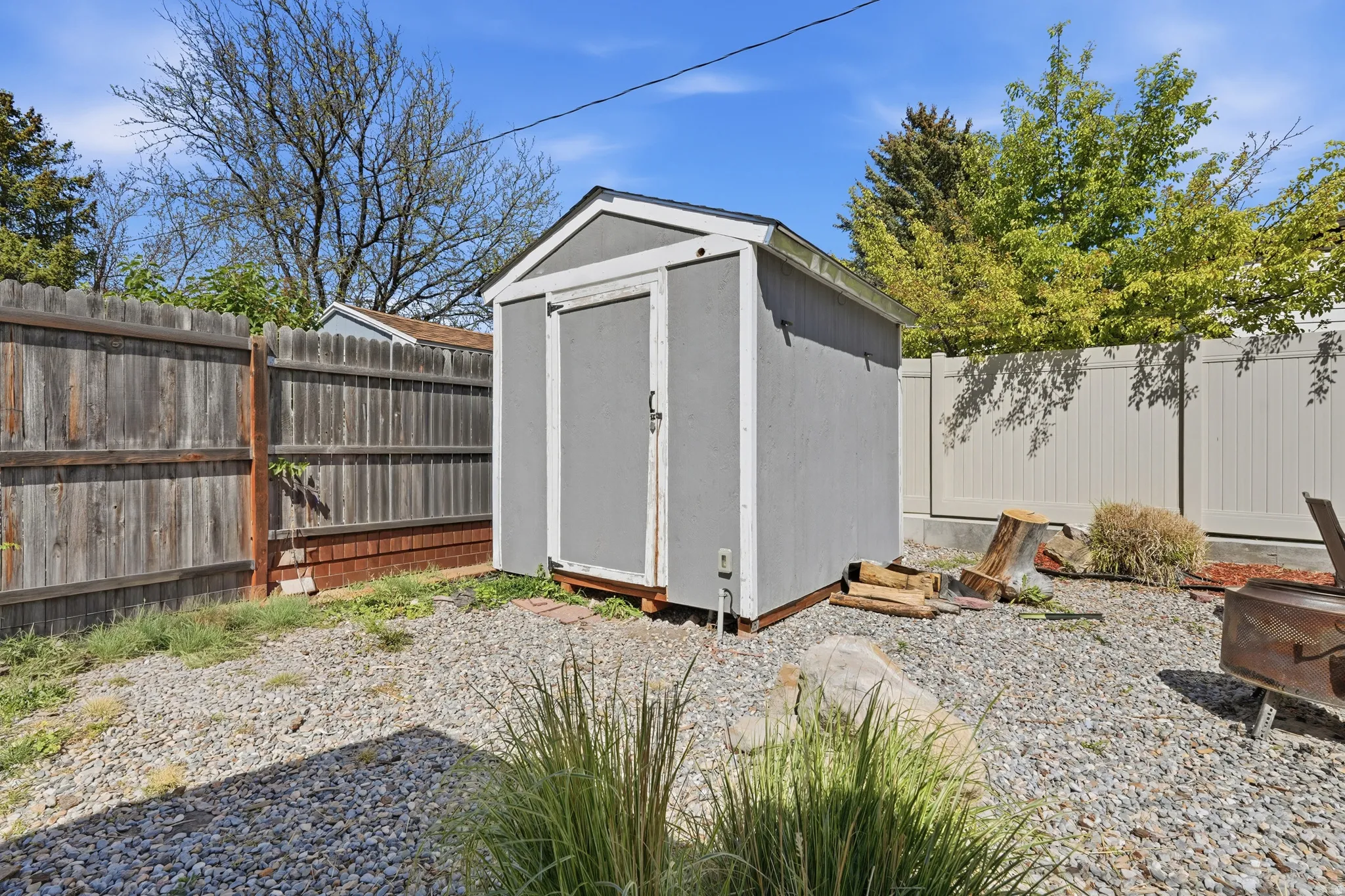 Detached storage shed with a gabled roof