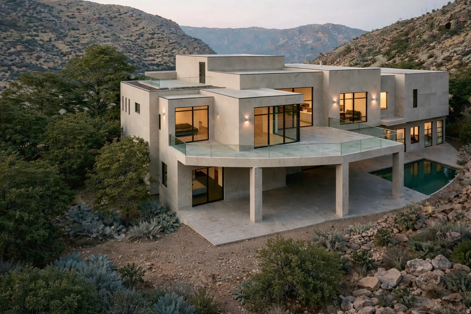 Modern multi-level residence featuring a stucco exterior and expansive window placement