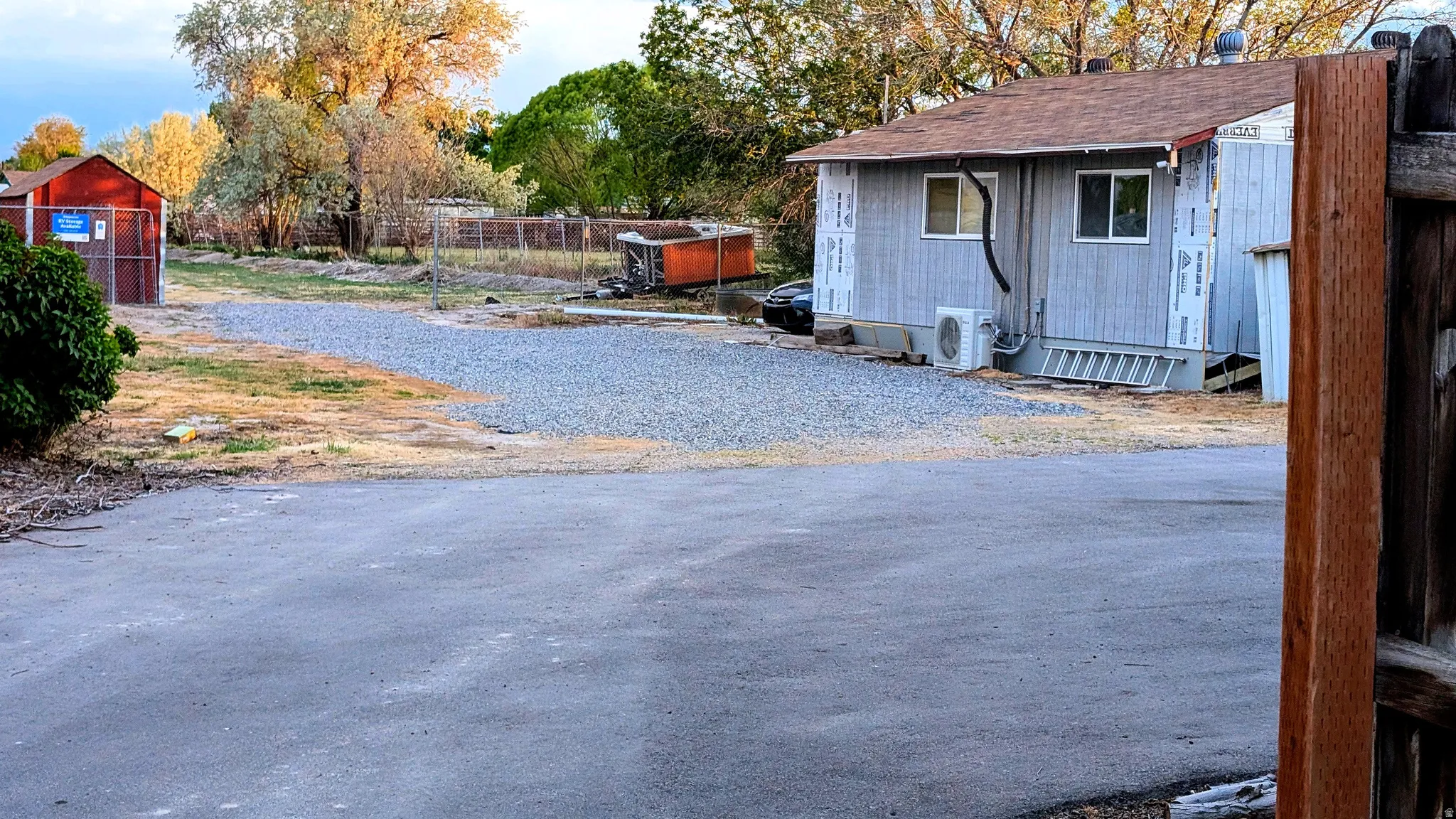 View of back yard with a workshop