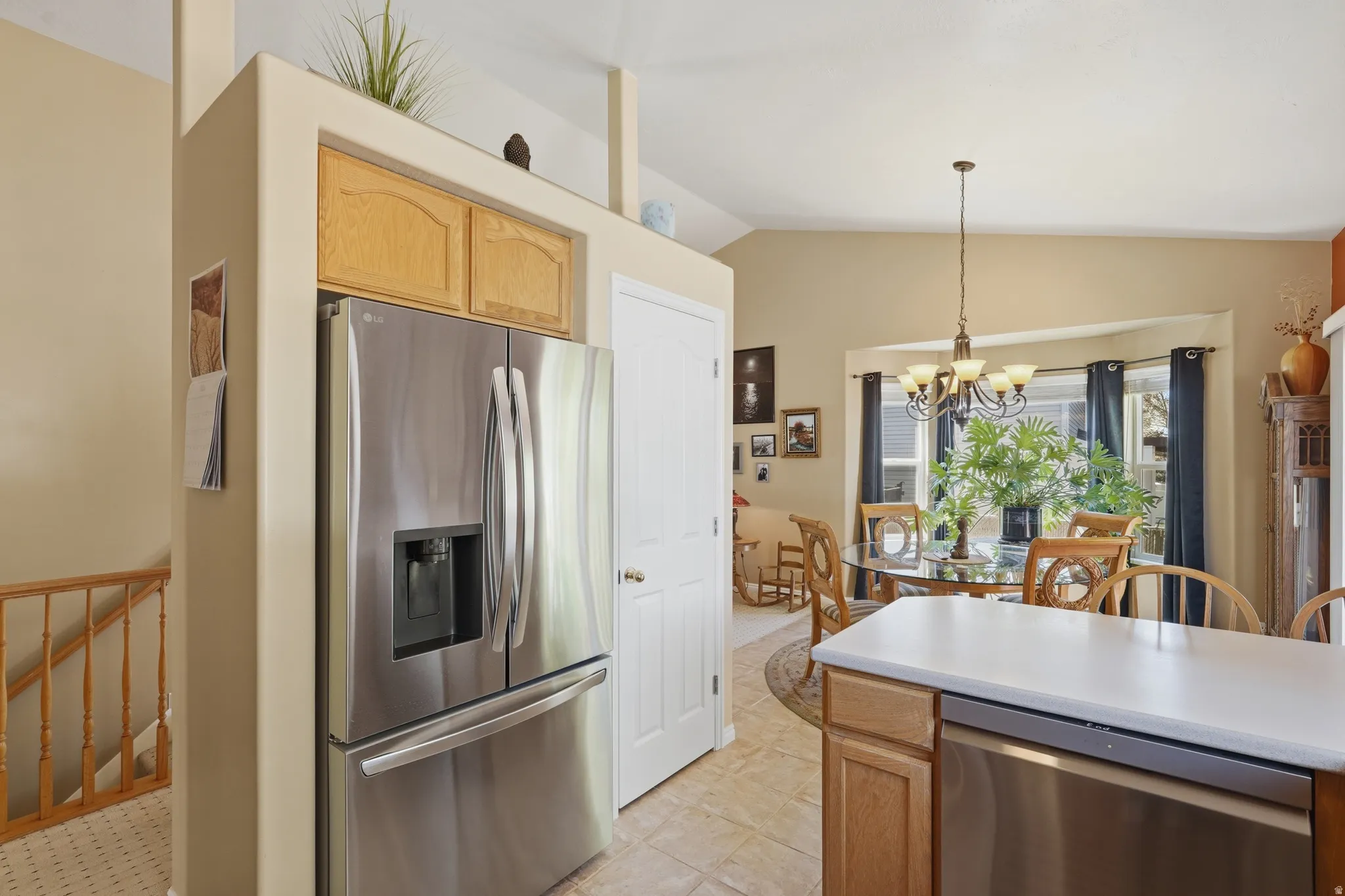 Stainless steel French door refrigerator connected to reverse osmosis drinking water filter