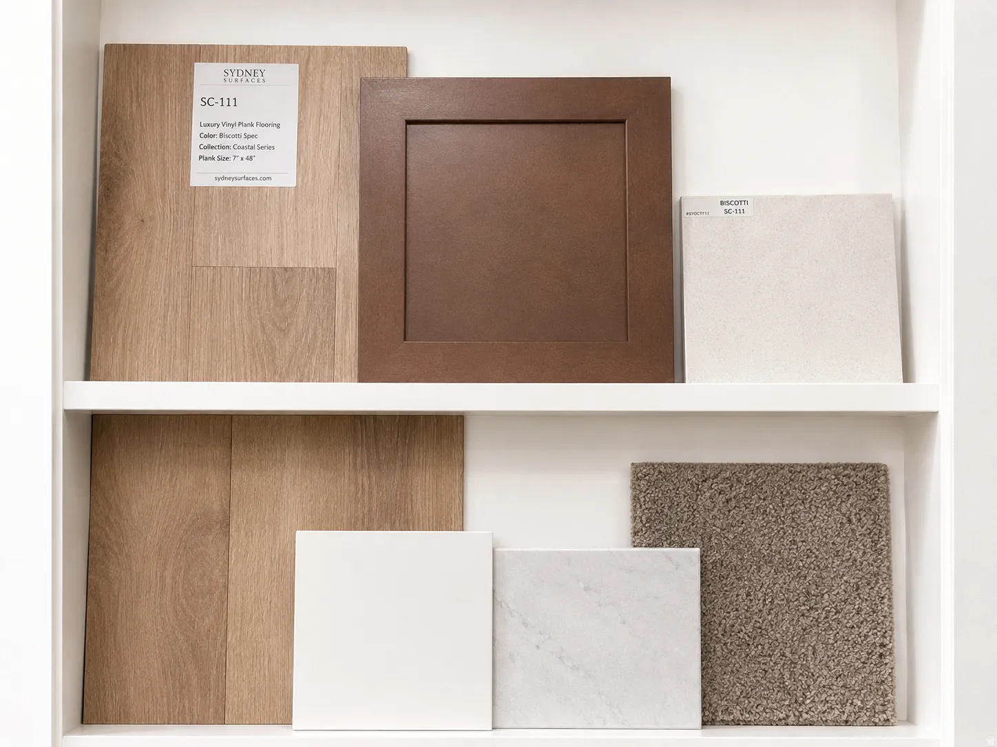 Finishes that have been selected for the home, including LVP flooring, cabinets, quartz countertops, and upstairs carpeting.