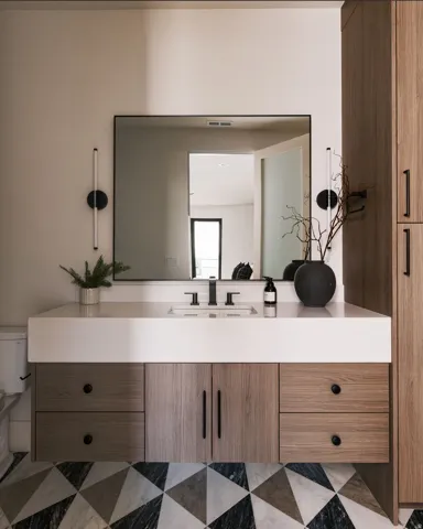 Floating vanity with integrated sink, quartz countertop, and matte black fixtures