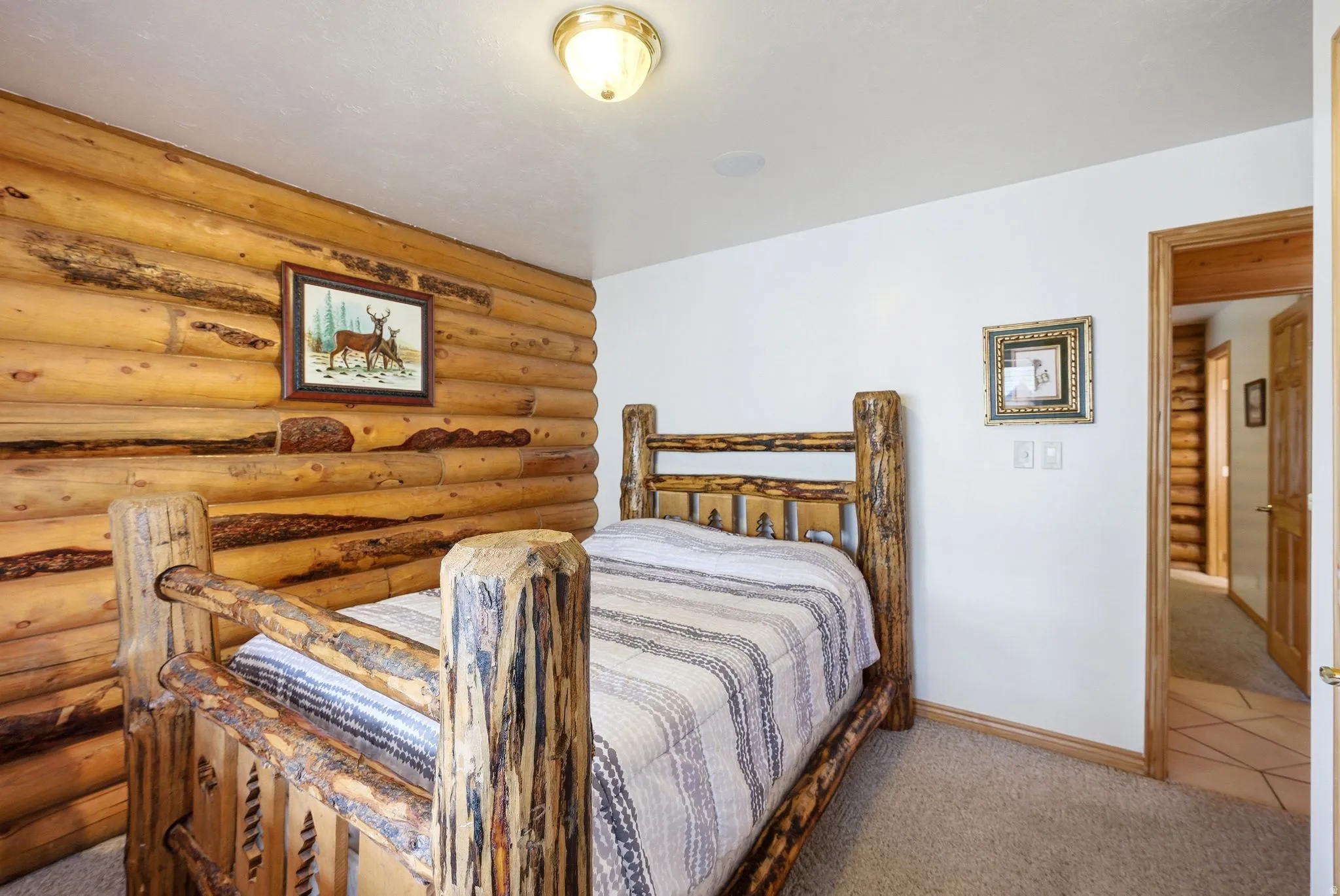 Log-style wall paneling with a natural finish