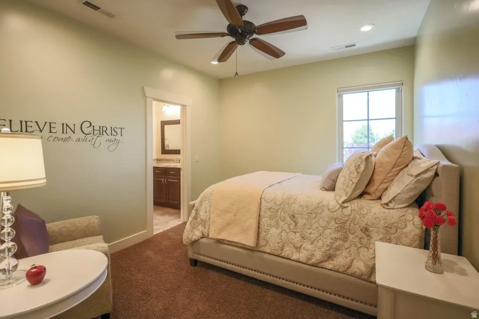 Bedroom featuring recessed lighting, a ceiling fan, a window, and carpet flooring