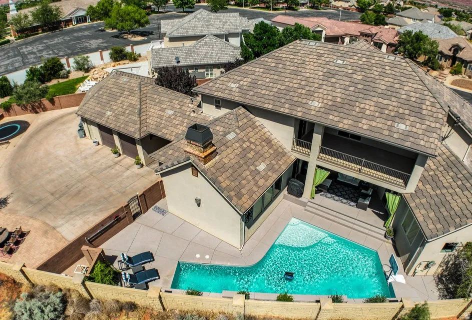 Terracotta tile roofing on a multi-level stucco exterior