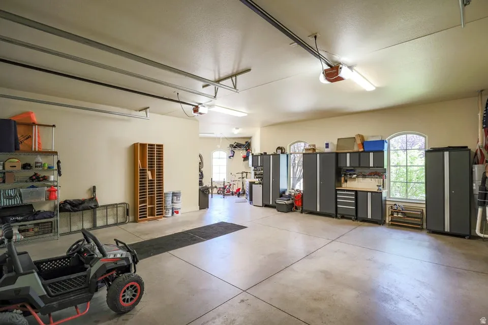 Expansive garage space with concrete flooring