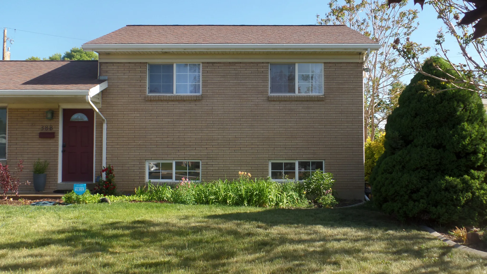 Front Yard of Traditional Brick Home