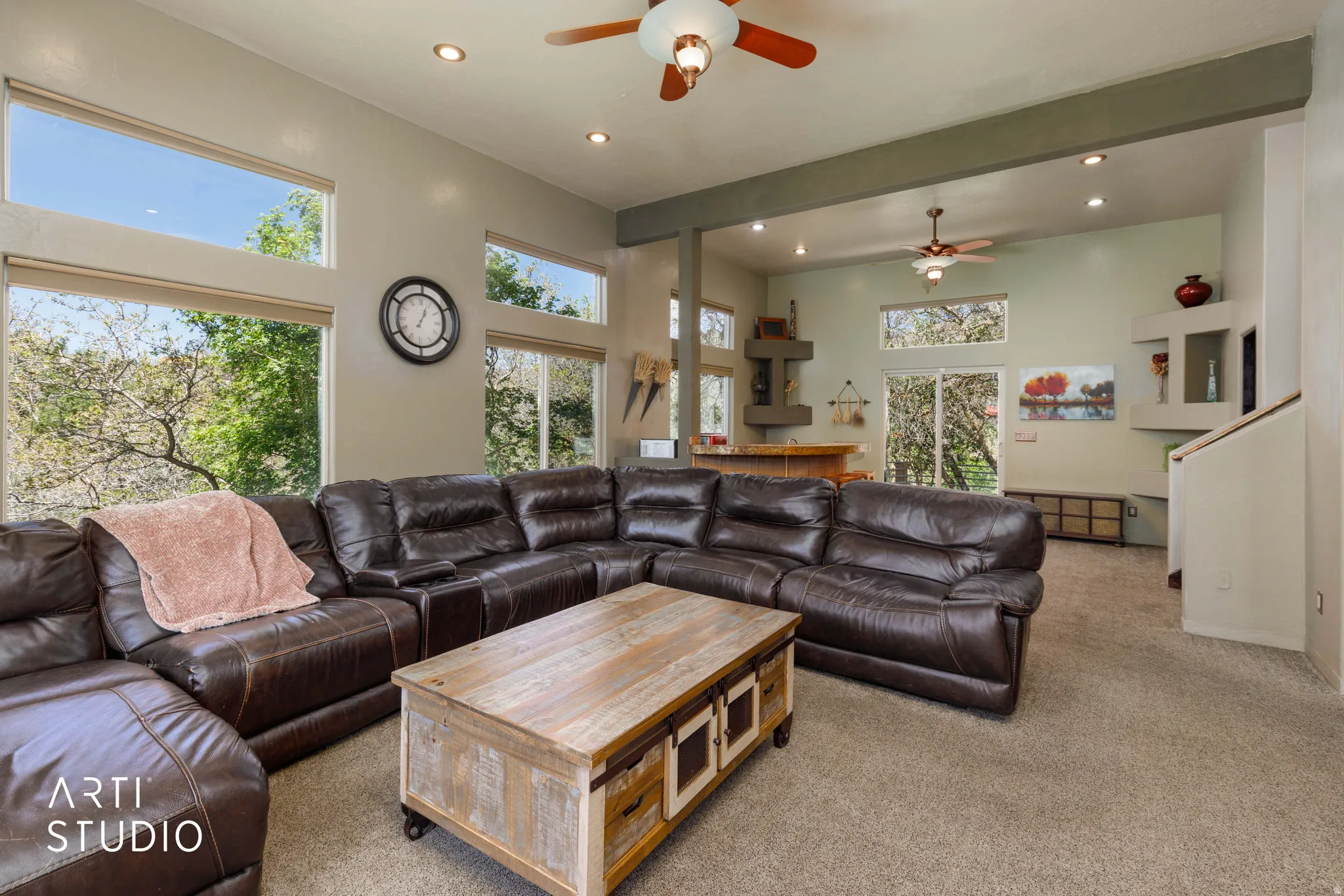 Vaulted ceilings featuring recessed lighting and ceiling fans