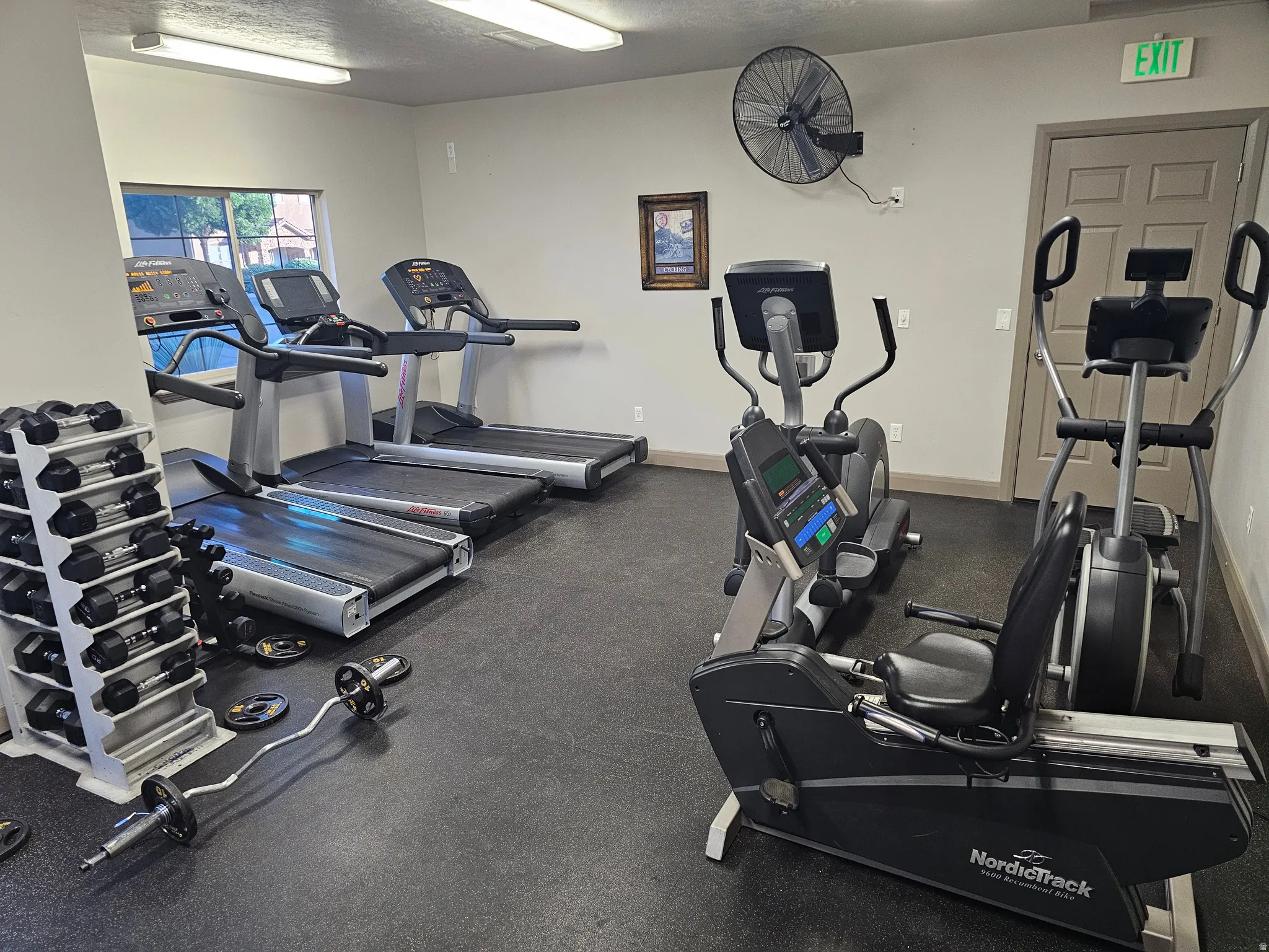 Fitness center featuring rubberized flooring