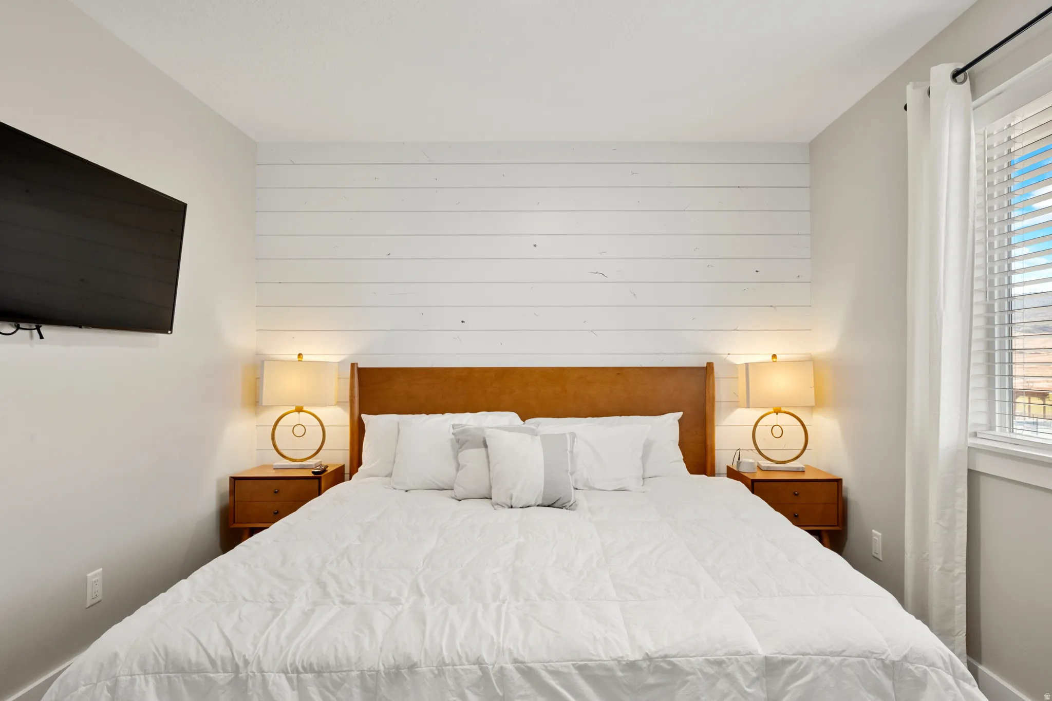 Accent wall featuring horizontal wood paneling
