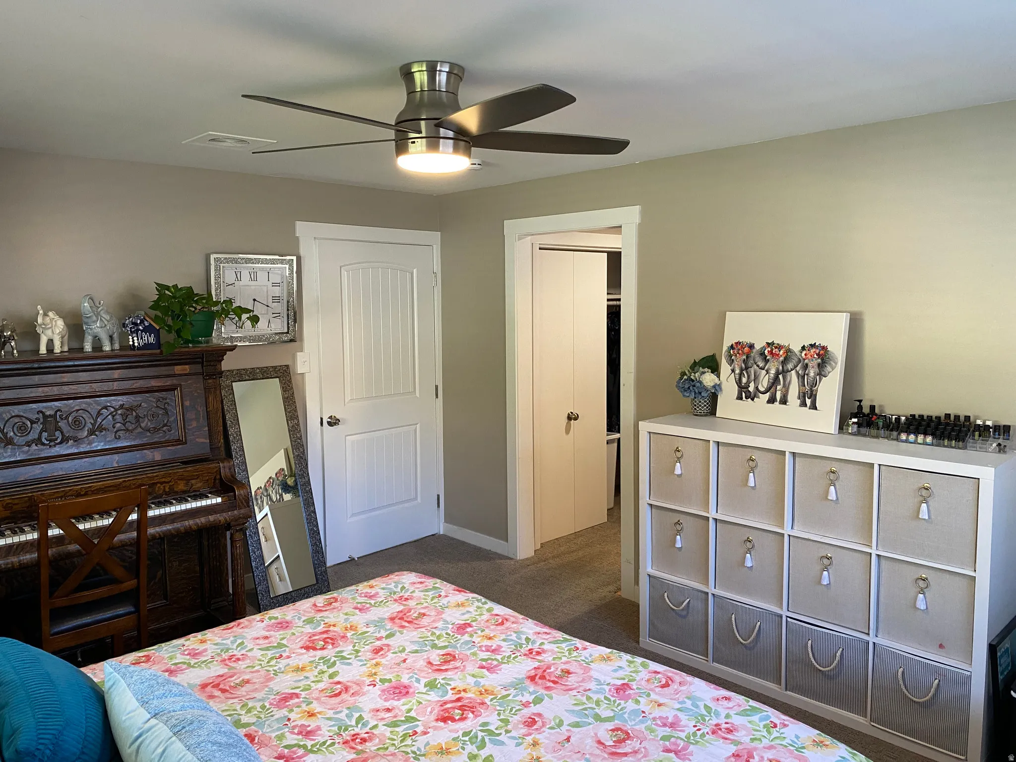 Neutral-toned walls and plush carpeting define this interior space