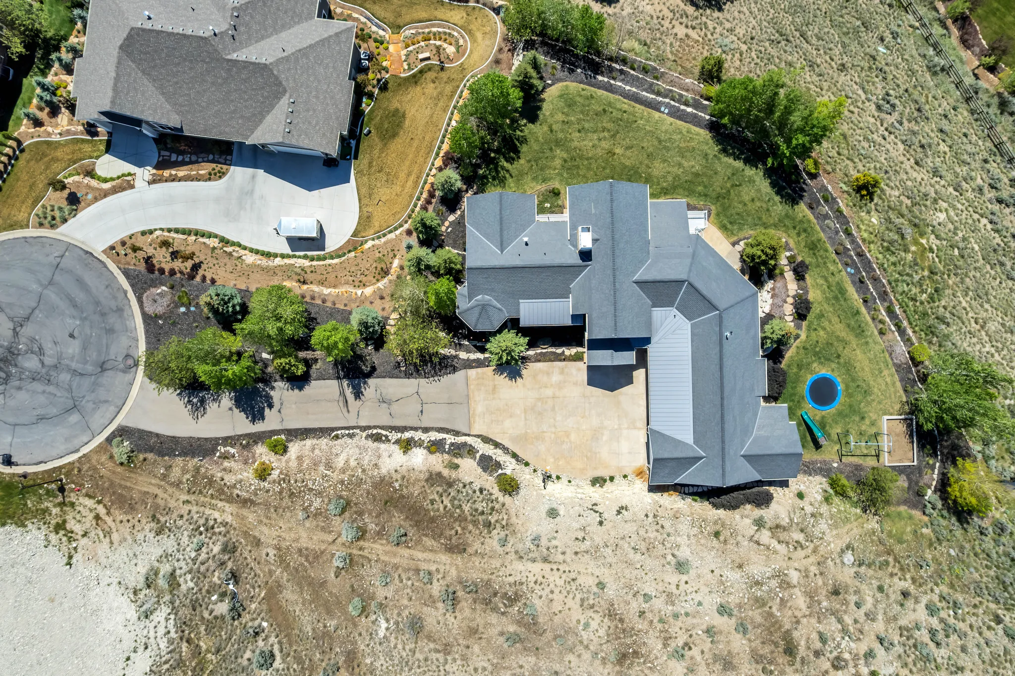Expansive aerial capturing the property's footprint