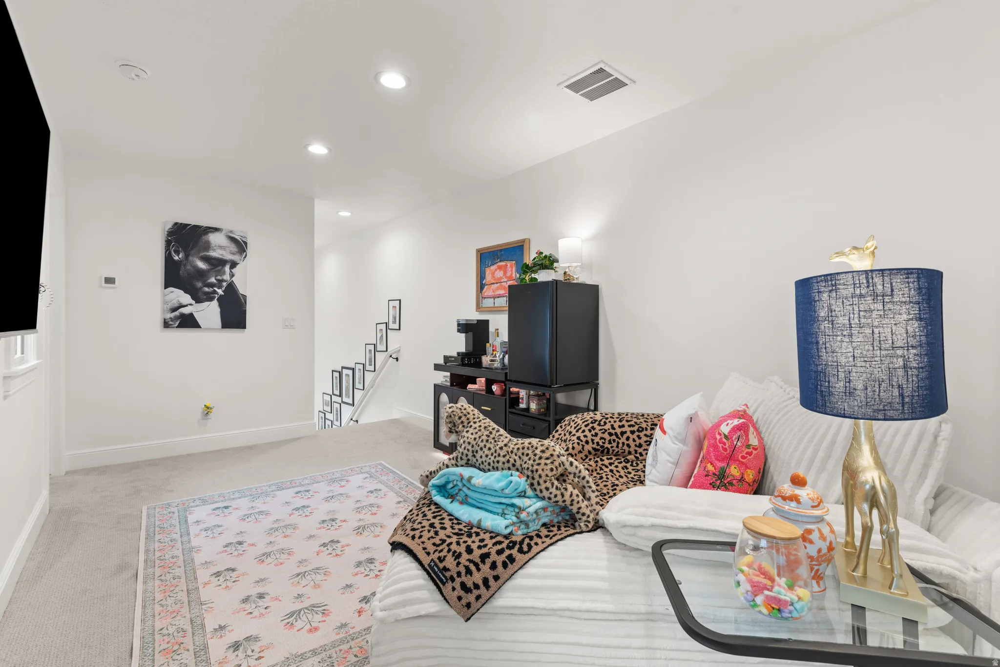 Loft area featuring a beverage station.