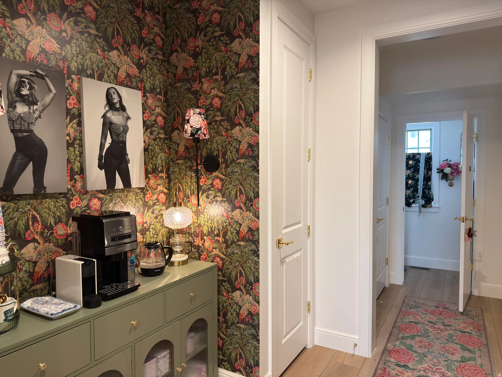 Custom built-in cabinetry featuring glass-front doors and brass hardware