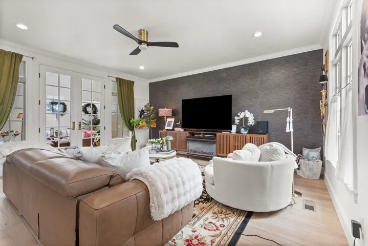Spacious living area featuring french doors to your private courtyard with heated concrete floors.