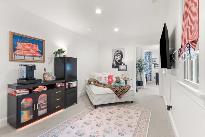 Loft area featuring a beverage station.