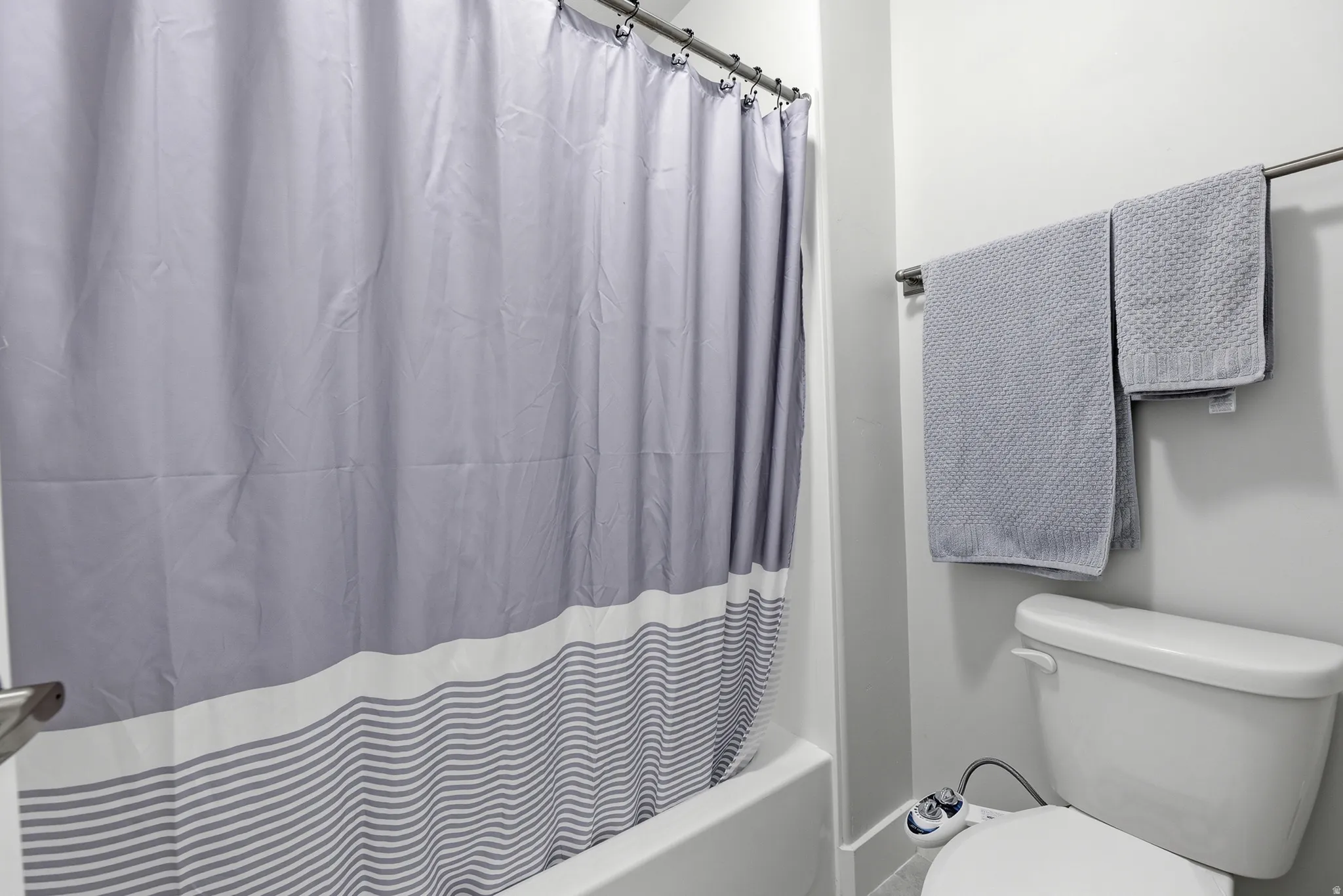 Private toilet/shower stall in Jack and Jill Bath