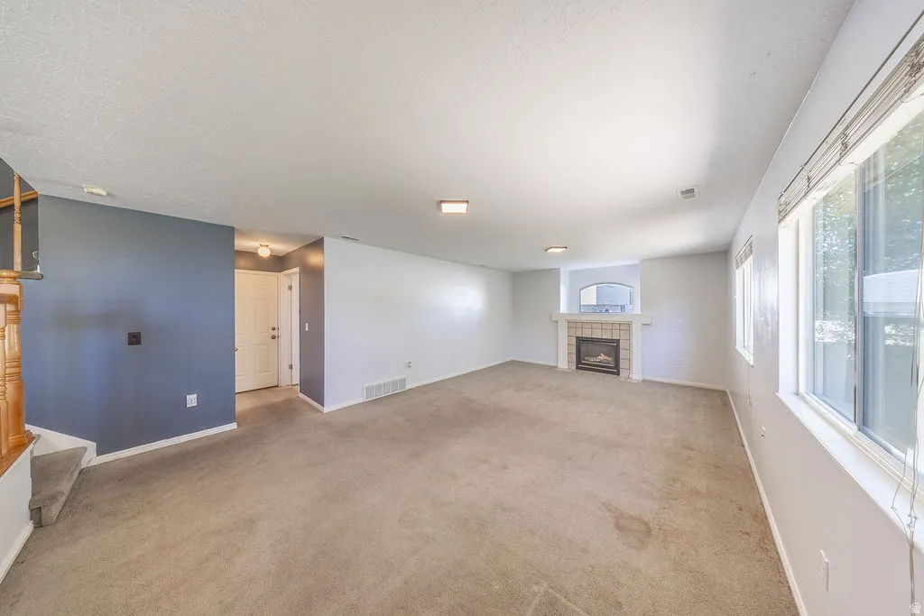 Family room looking toward hallway and garage door.