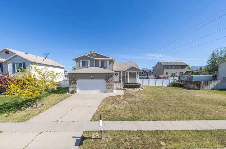 5 BR 3.5 BA 2 Car Garage home.  Spacious yards.  White vinyl fencing.  Gates on both sides.