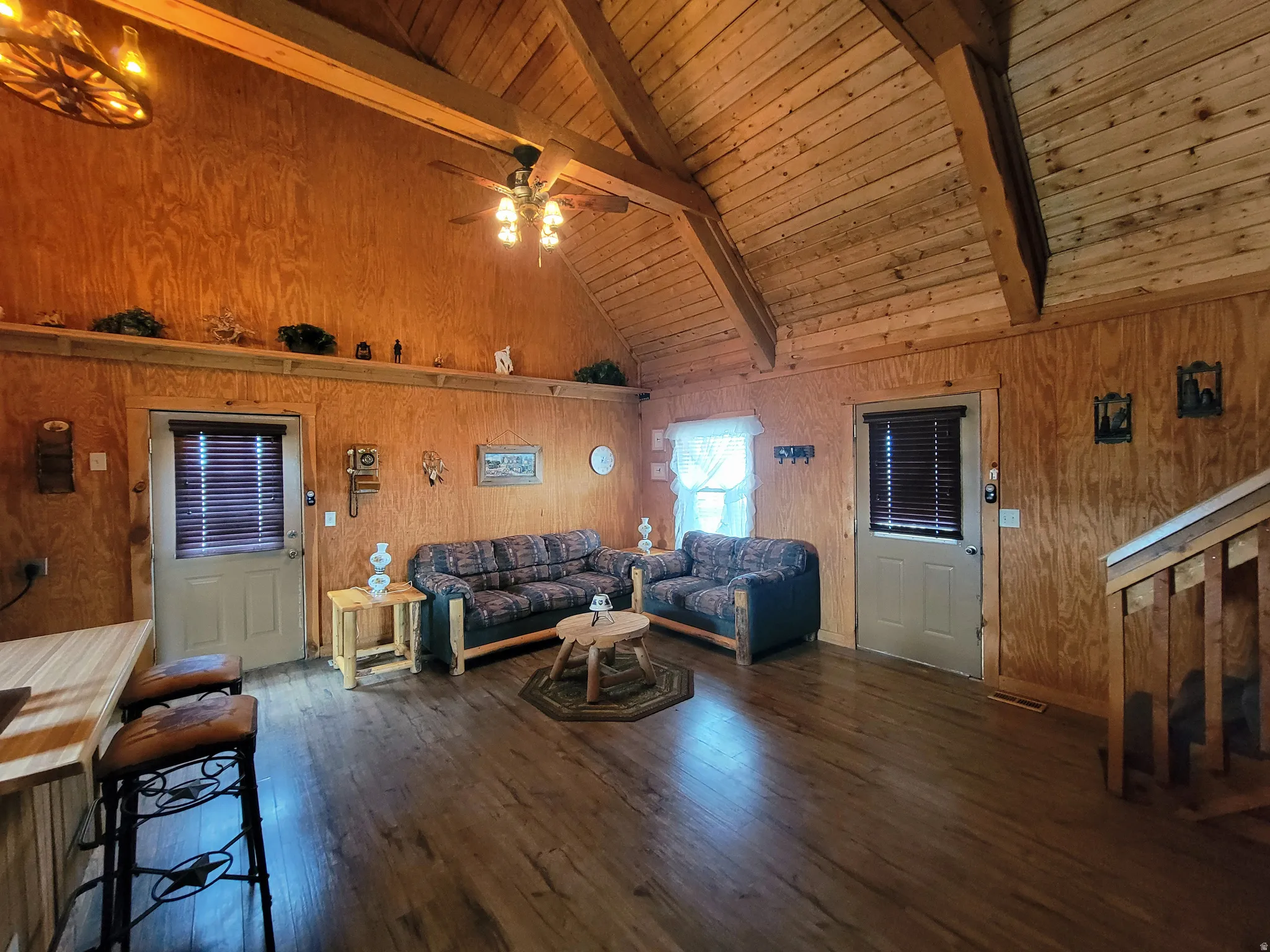 Vaulted wood-paneled ceilings with exposed beams