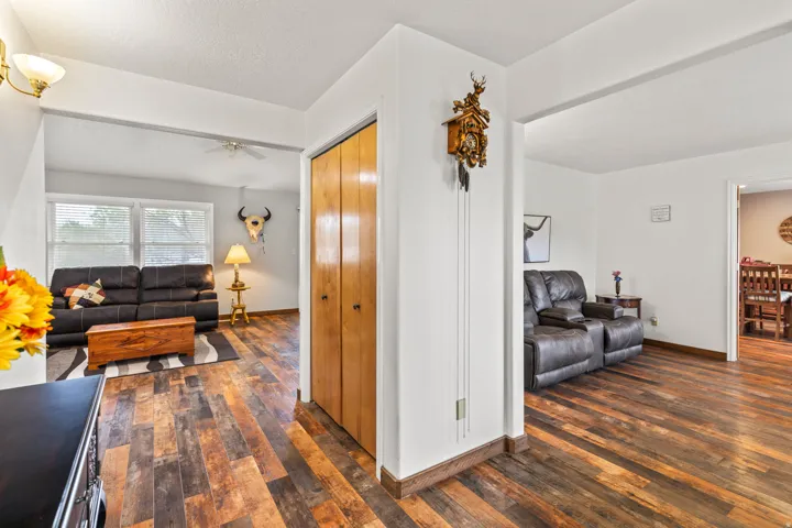 Wood-finish flooring extends throughout the space