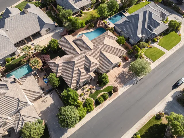 Expansive property with multiple pools and mature landscaping