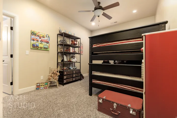 Spacious room featuring carpeting, recessed lighting, a ceiling fan, and light-colored walls