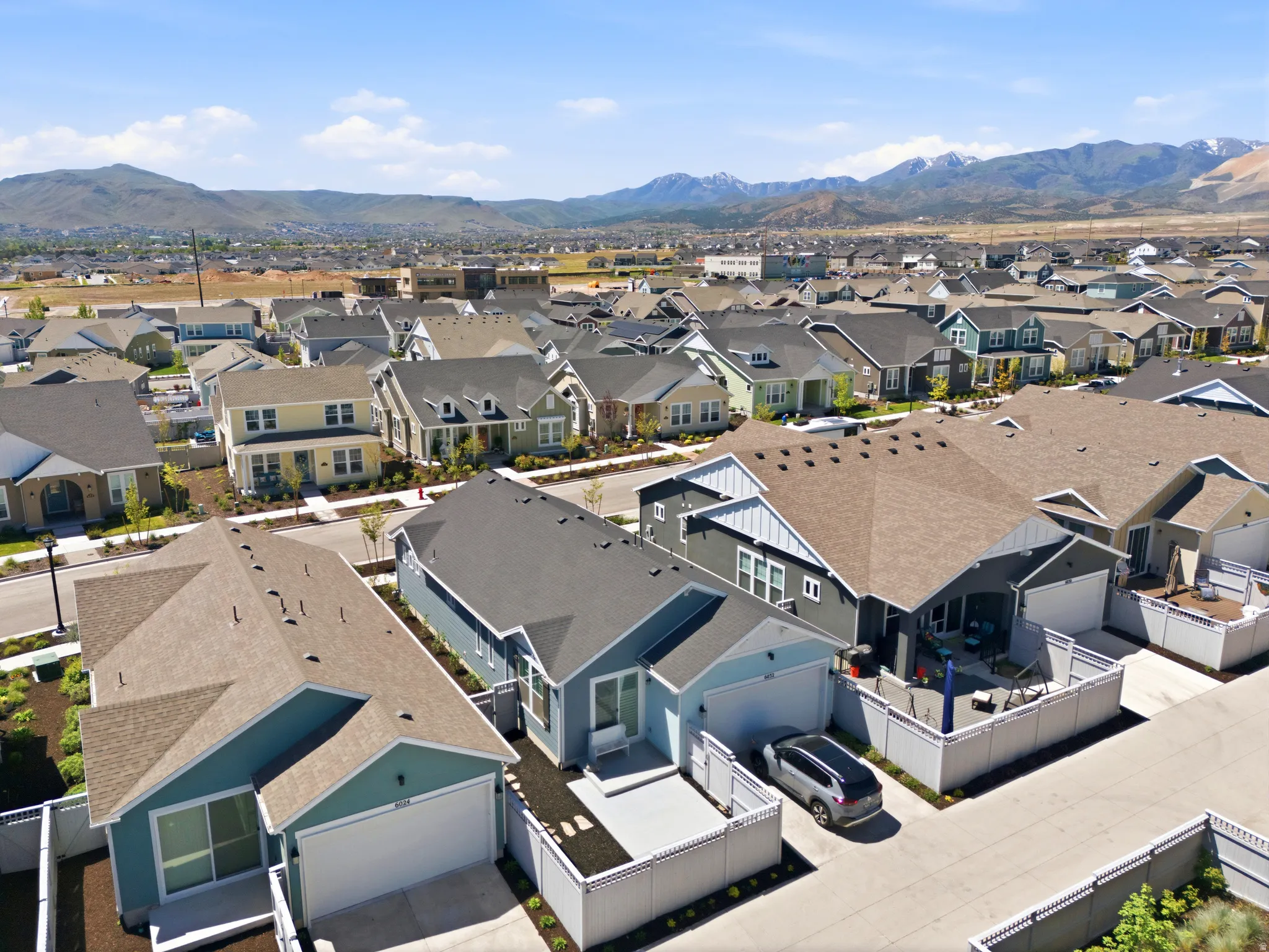 *NOTE* the driveway accommodates a vehicle - the newer and "To Be Built" homes, have a very small concrete area.