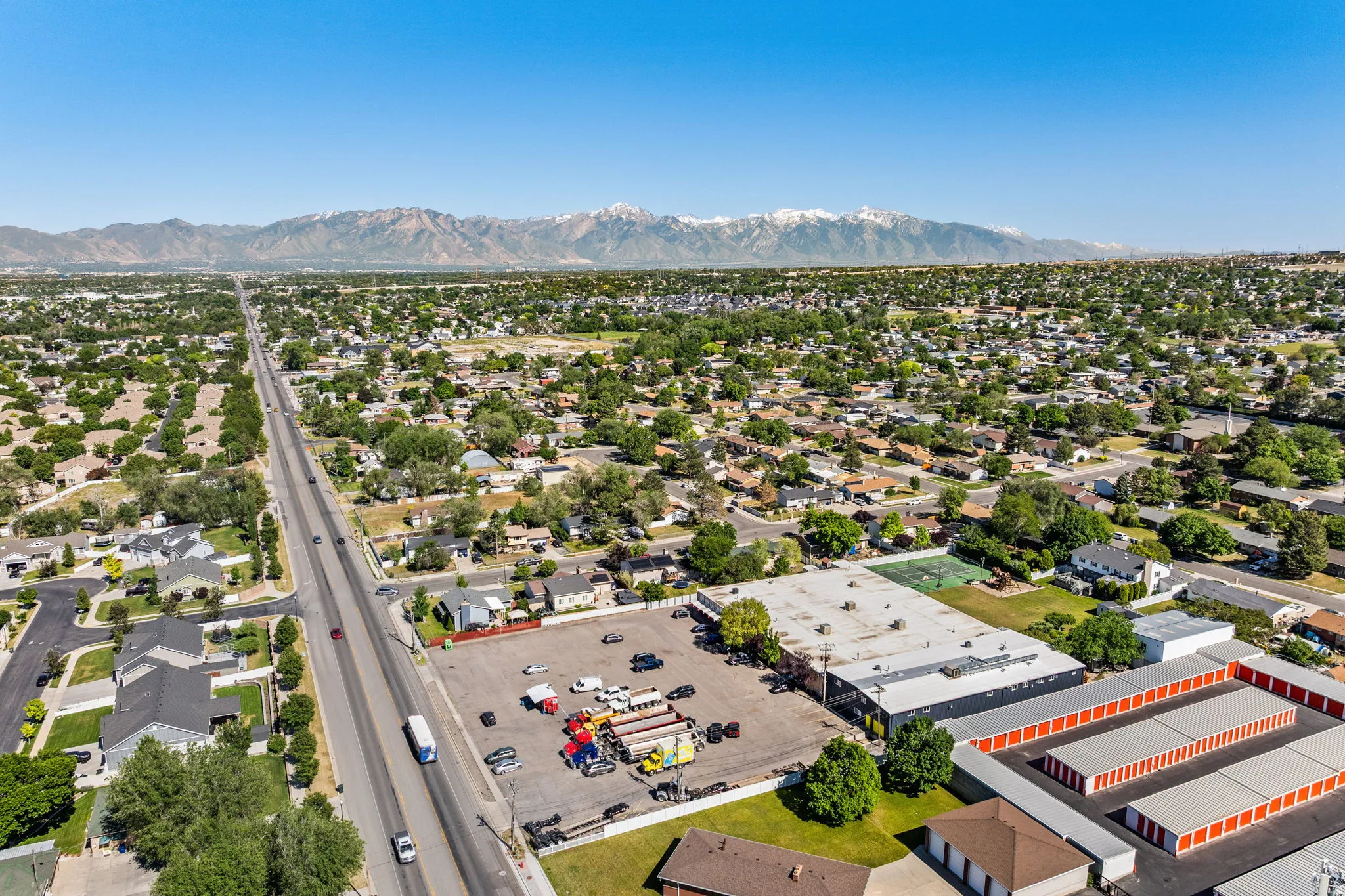 Expansive aerial perspective showcasing a broad residential area with varied housing styles