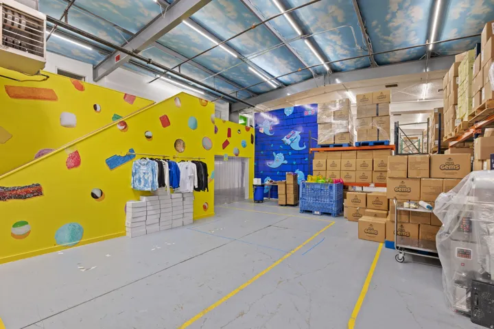 Spacious interior with industrial concrete flooring and high ceilings
