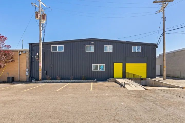 Industrial building with a dark gray corrugated metal facade