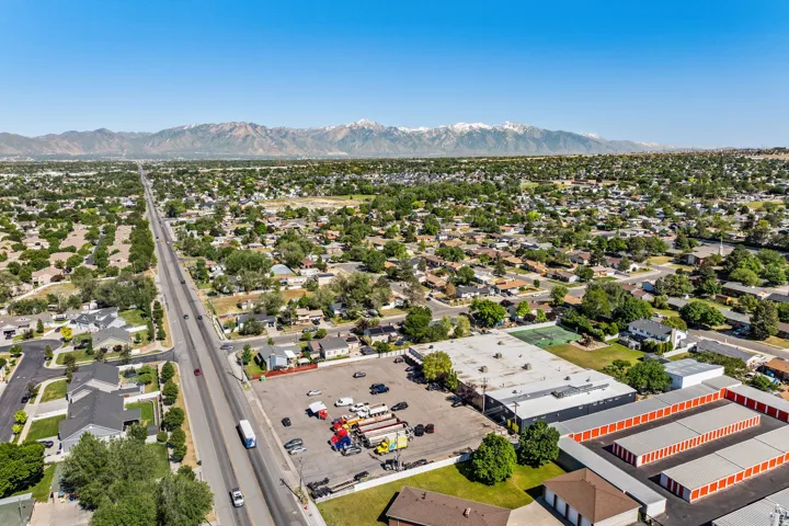 Expansive aerial perspective showcasing a broad residential area with varied housing styles