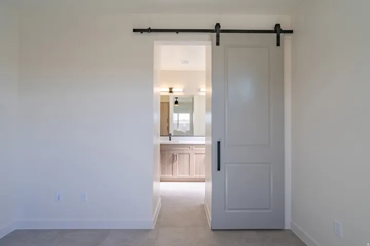 Sliding barn door with black hardware