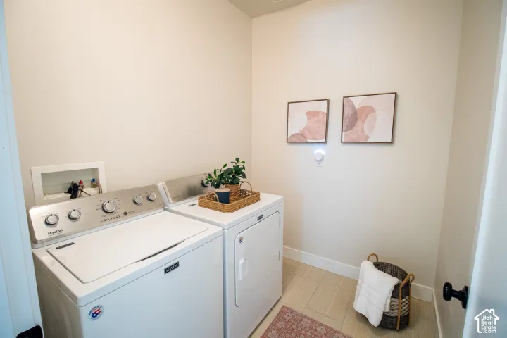 Light-toned walls complement the wood-finish flooring