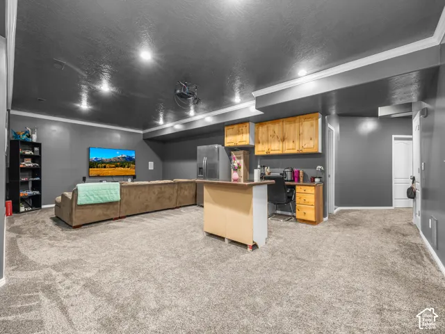 Spacious room featuring gray walls and ceiling with recessed lighting