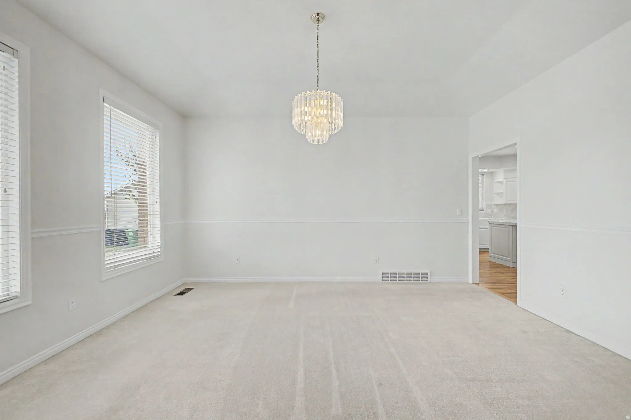 Neutral tone carpeting throughout