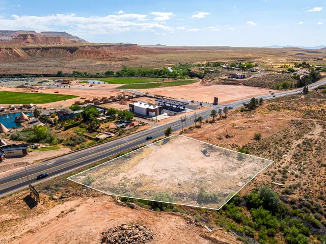 Expansive land parcel featuring direct road frontage and a relatively level topography