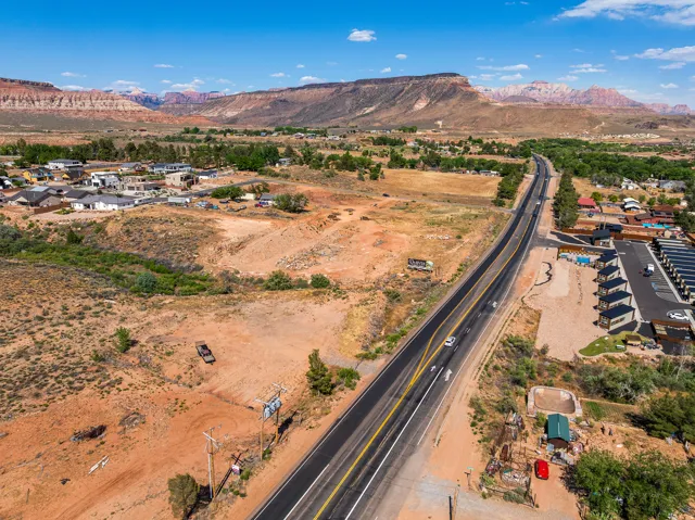 Expansive land parcel featuring desert landscaping and mountain backdrops