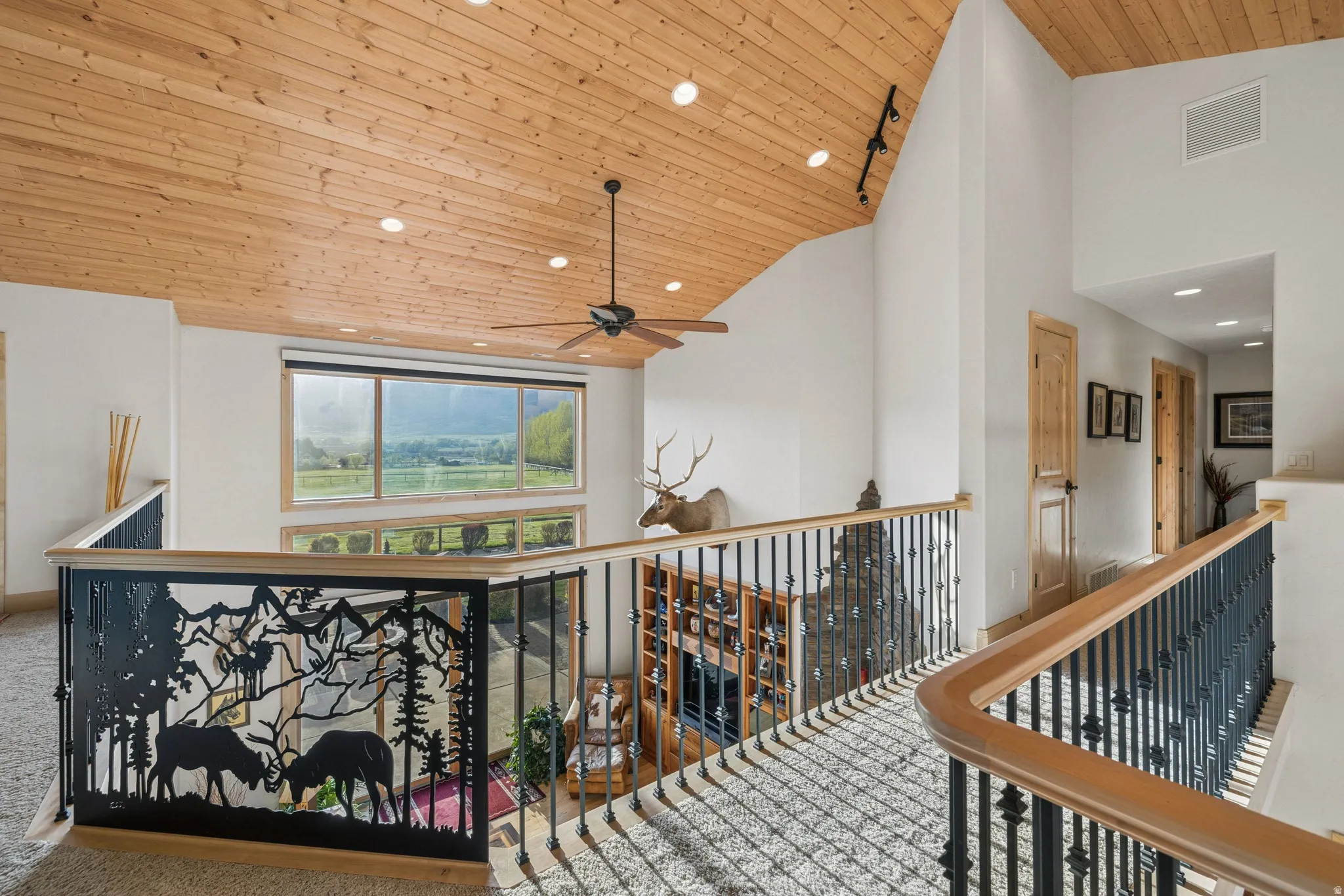 Hall featuring a vaulted wooden ceiling, carpet flooring, and recessed lighting
