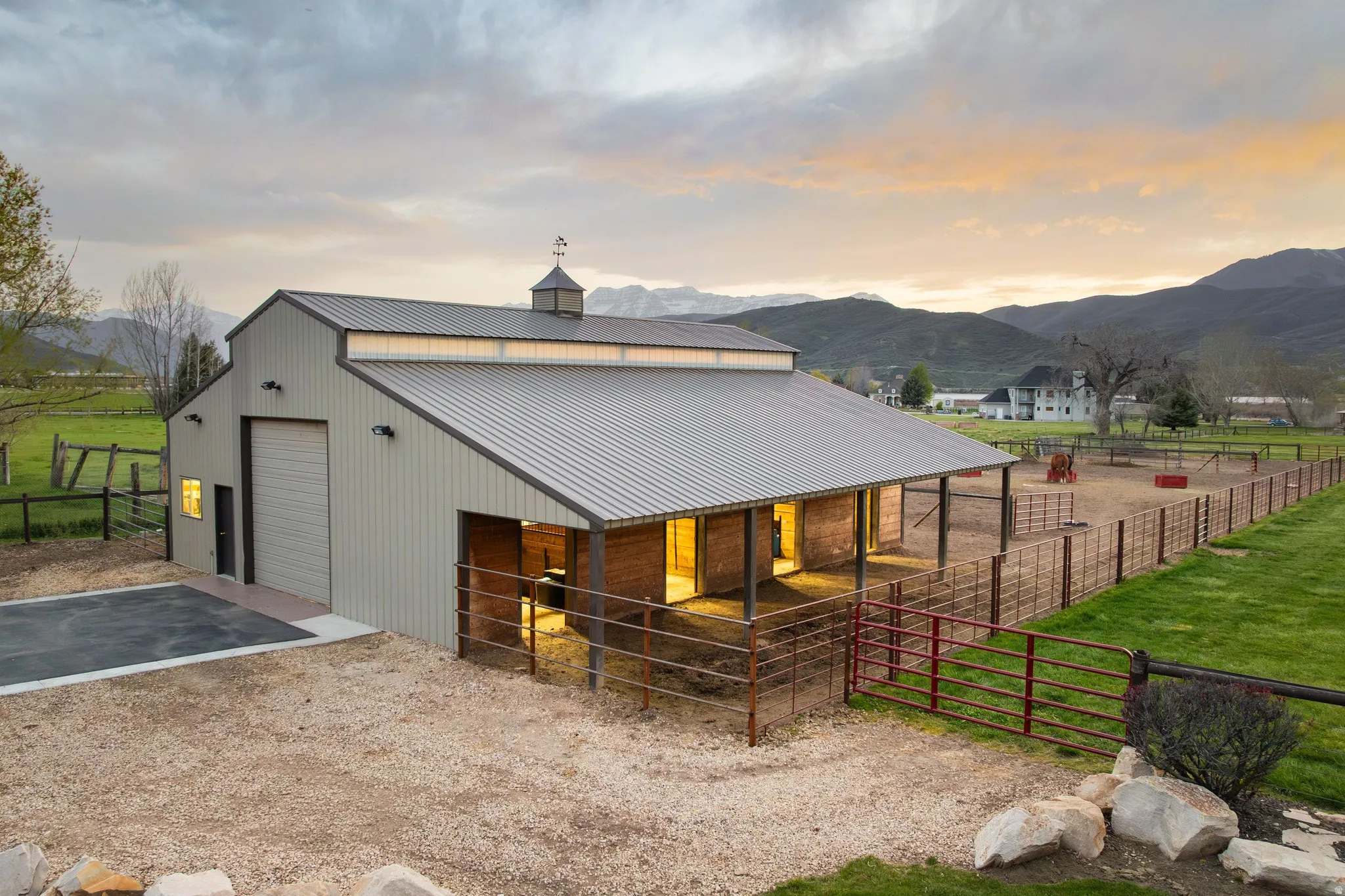 Stable featuring a mountain view and a view of rural / pastoral area
