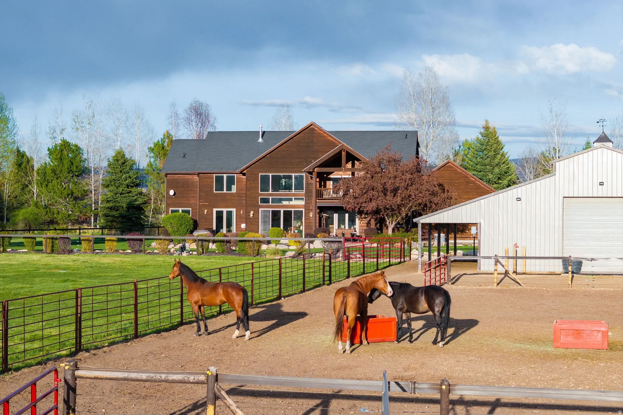 View of property's community with an outdoor structure and a garage