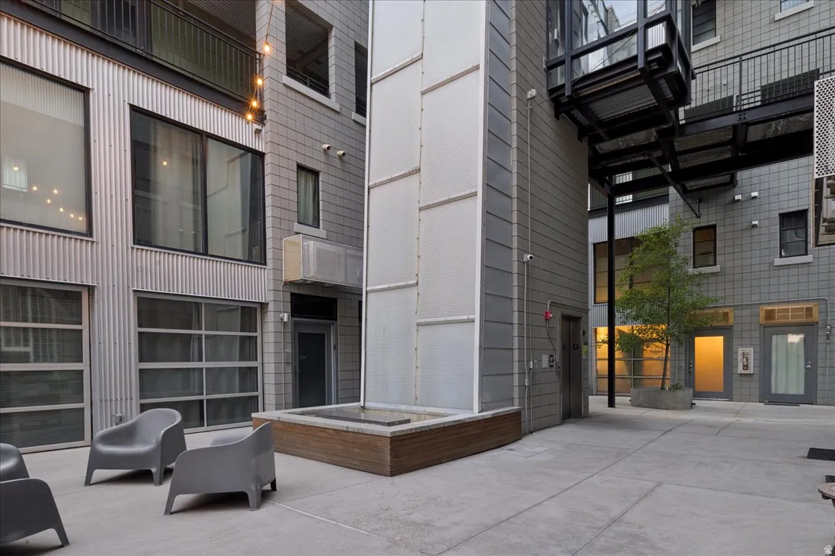 Outdoor courtyard with concrete paving