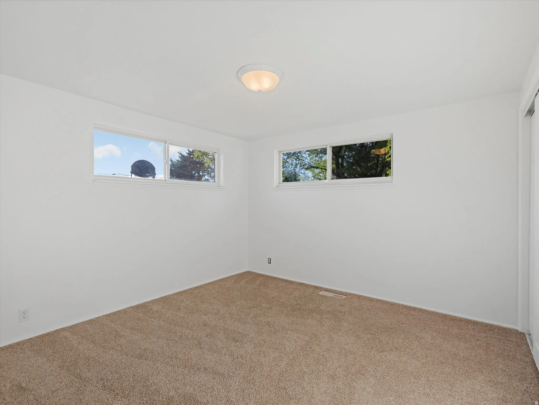 Primary Bedroom Option for the main level with 2 double closets