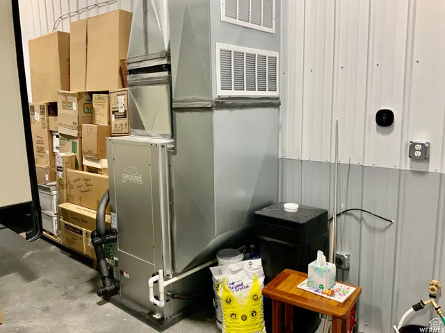 Geocool HVAC system with associated ductwork and wall-mounted registers