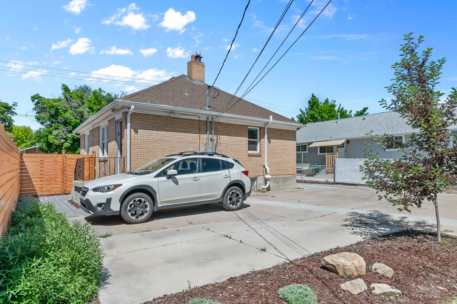 Paved driveway providing off-street parking