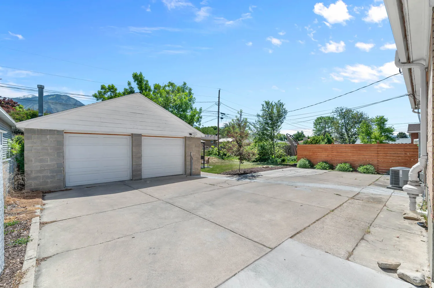 Two-car detached garage with block construction and a gabled roof