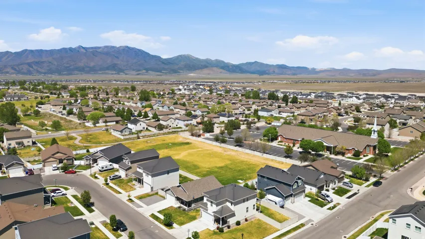 Aerial perspective showcasing a residential neighborhood with varied home styles and mature landscaping