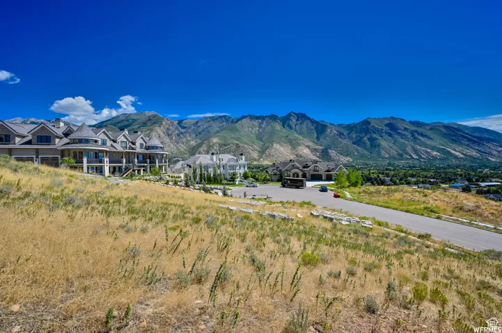 Expansive mountain landscape provides a dramatic backdrop for the surrounding properties